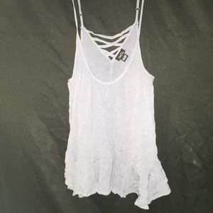 a sky grey/ blue tank with cross back
